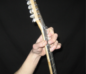 Good fret hand position 2 - https://supertonicguitar.com/wp-content/uploads/2018/01/guitar-good-fret-hand-position-2.png